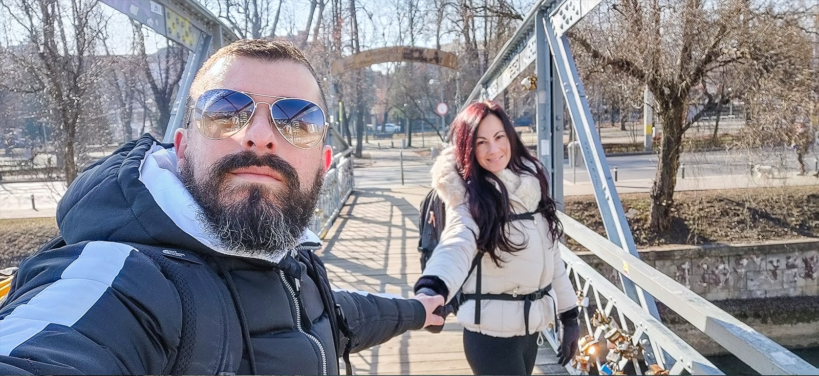 Man and lady on a bridge