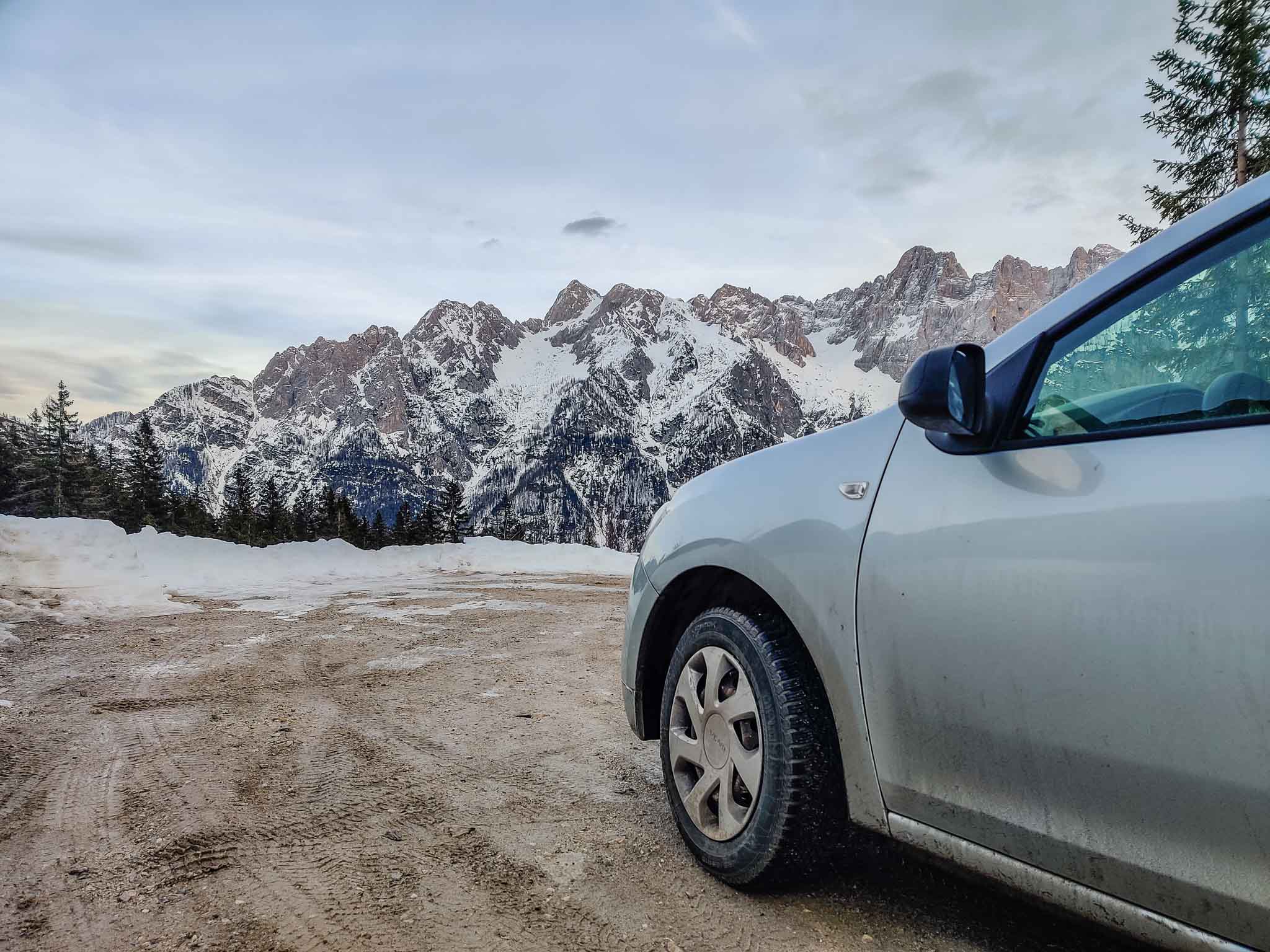 A car and snowy mountains