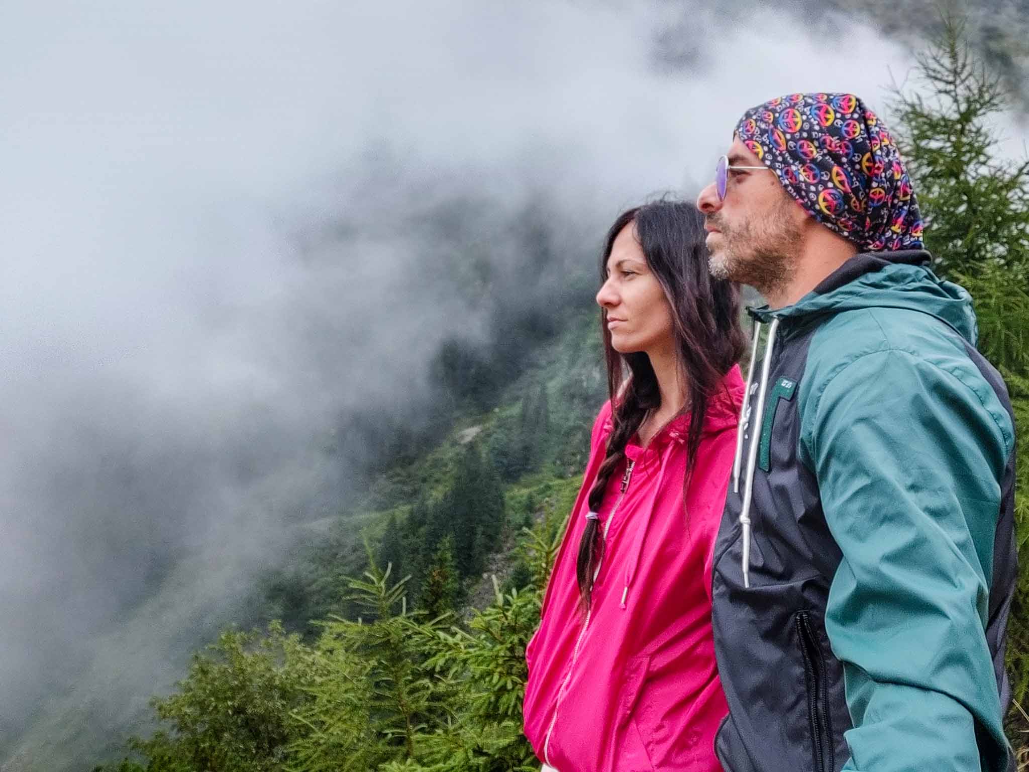 A couple looking at the view with fog