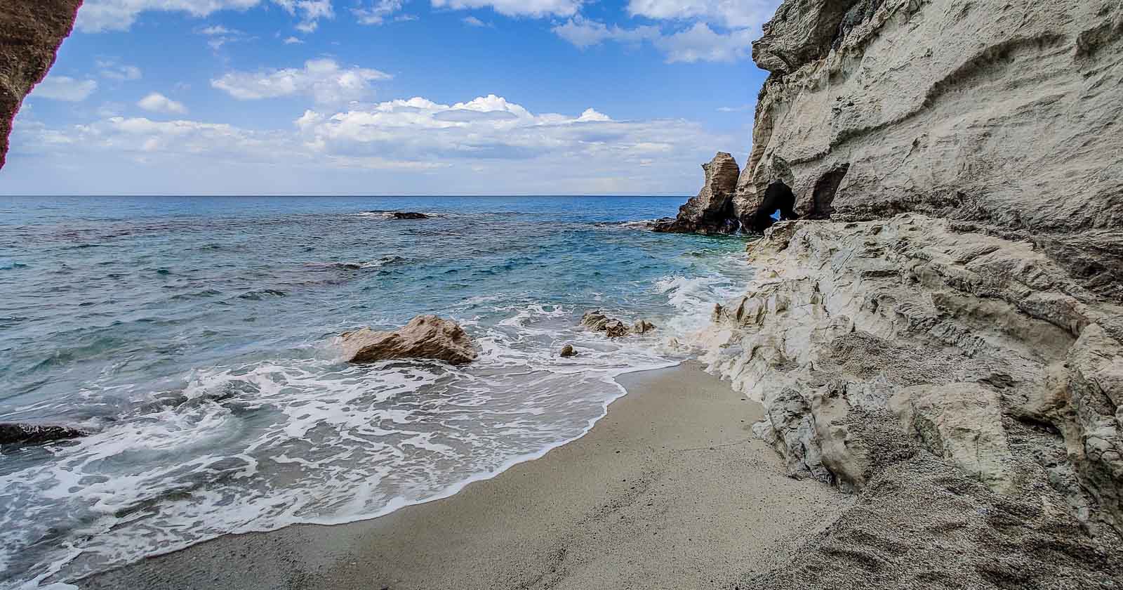 Sea near rocky cliffs in Tropea